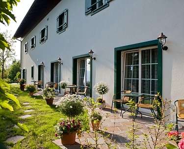 Pausa nel giardino verde al Romantik Hotel Die Gersberg Alm Pausa nel giardino verde al Romantik Hotel Die Gersberg Alm